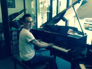 Customer with his new Yamaha Disklavier