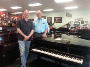 Our Specialist Dave with customer Jack and his new piano