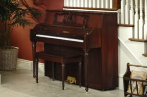 upright piano with bench