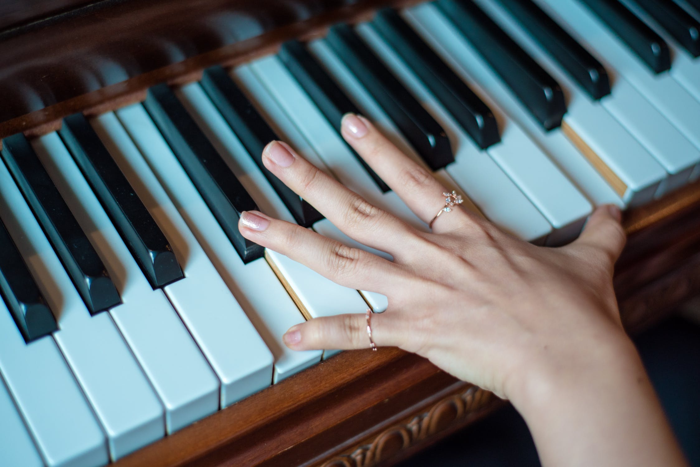 small hand on piano