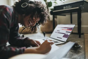 girl at computer smiling