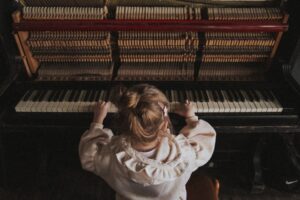 woman playing piano