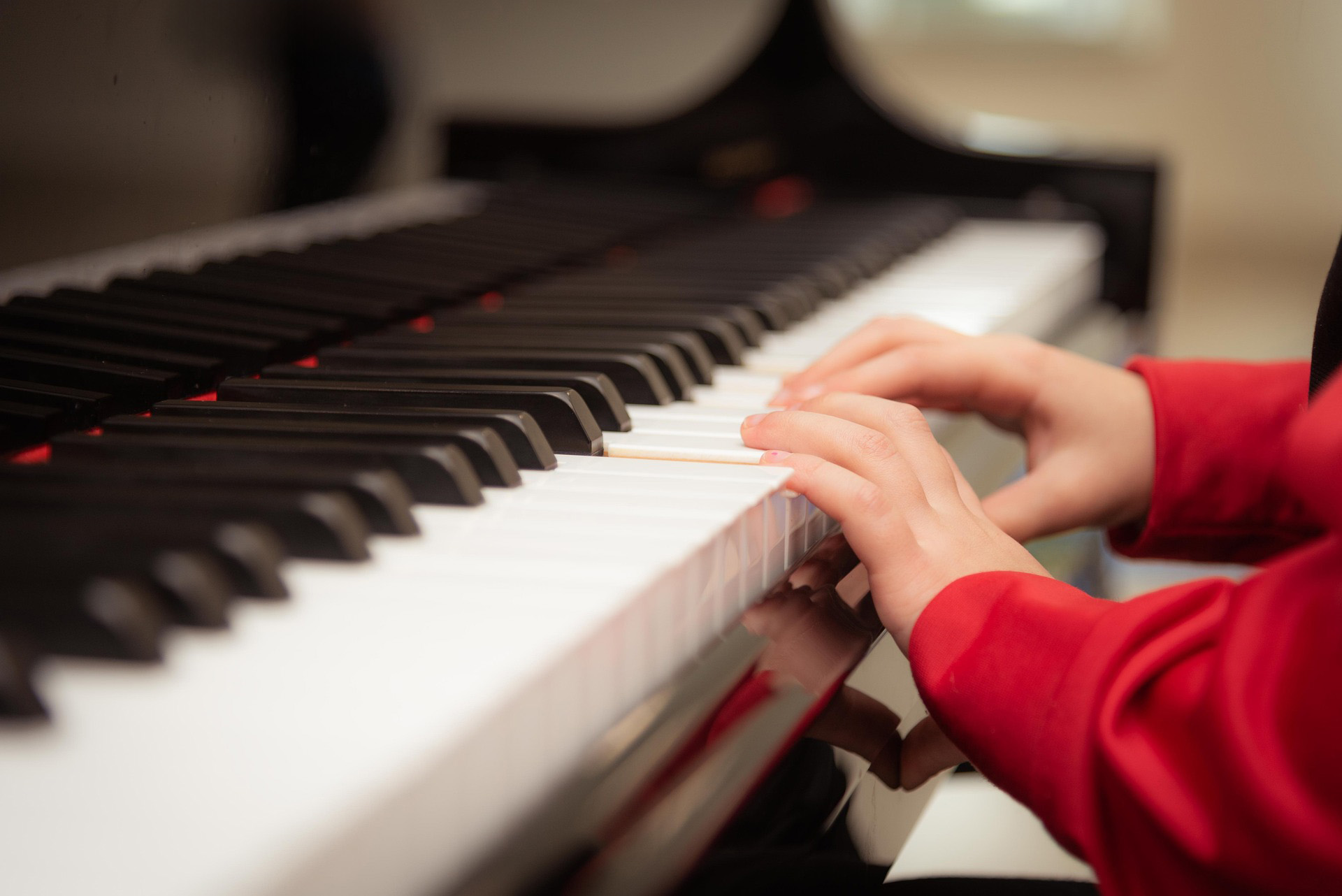 Child practicing piano
