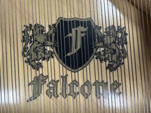 Falcone logo in piano soundboard