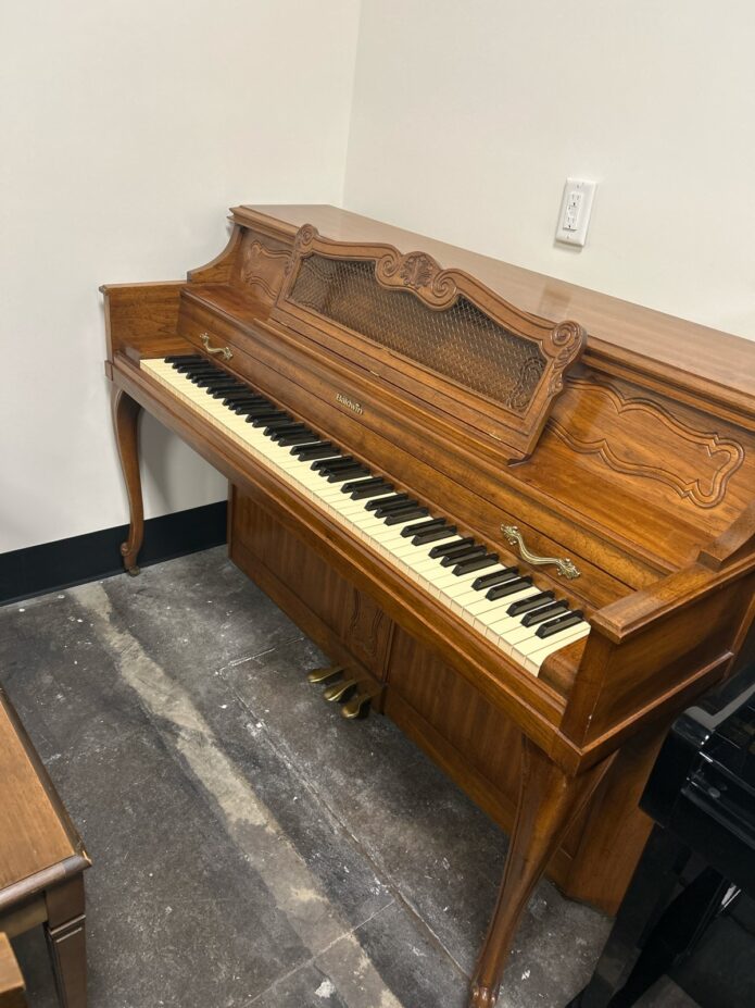 Used Baldwin 913 vertical piano in French pecan finish