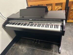 Used Lowrey EZP8 Digital Console Piano in showroom condition.